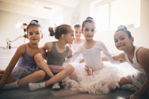 Dancers sitting together